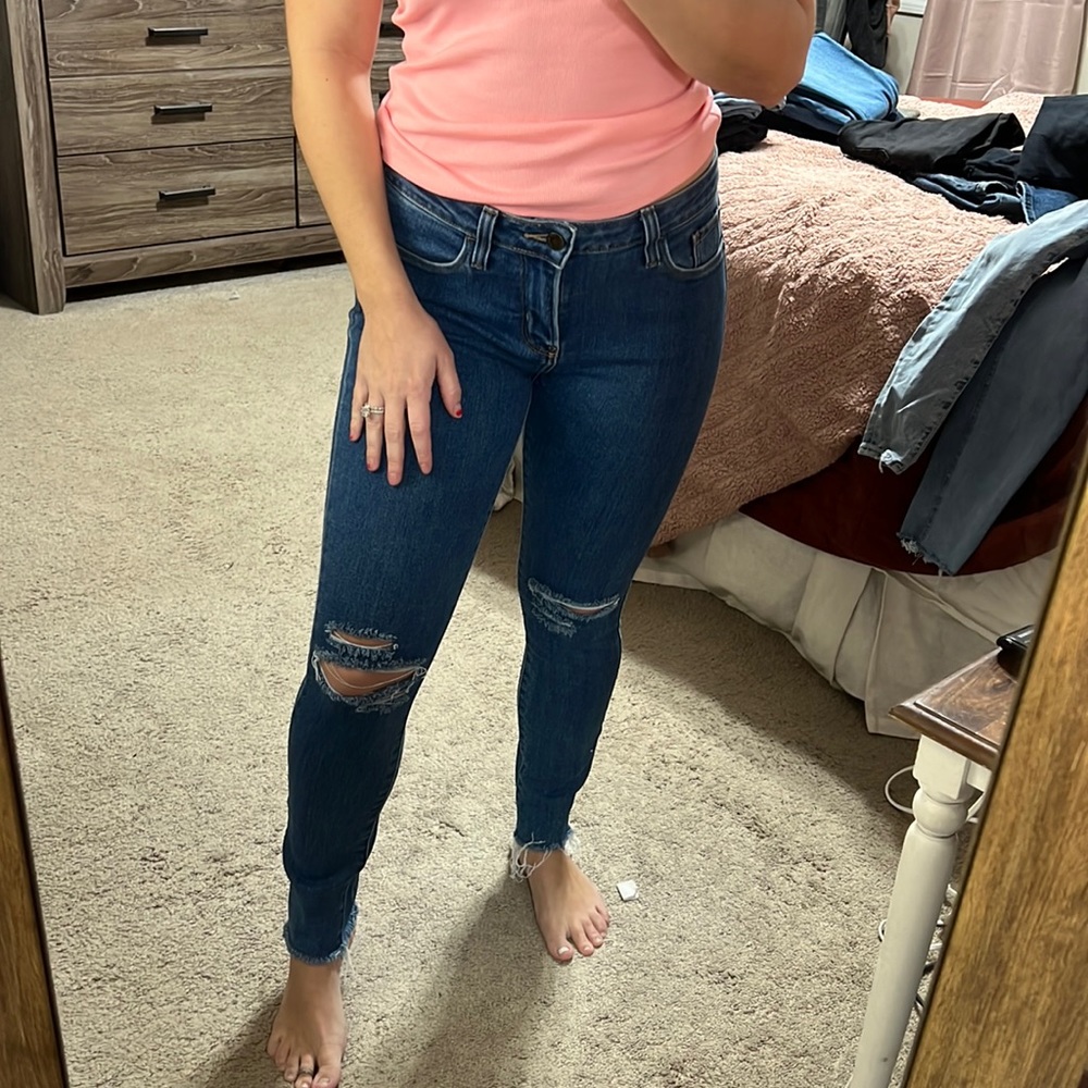 Blue jeans with rips